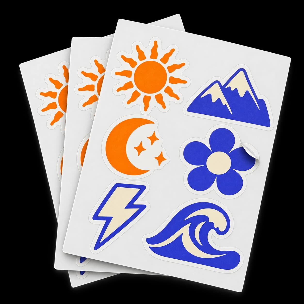 Stack of white sheets with six separate purple and orange sun, mountain, moon, flower, lightning, and wave stickers