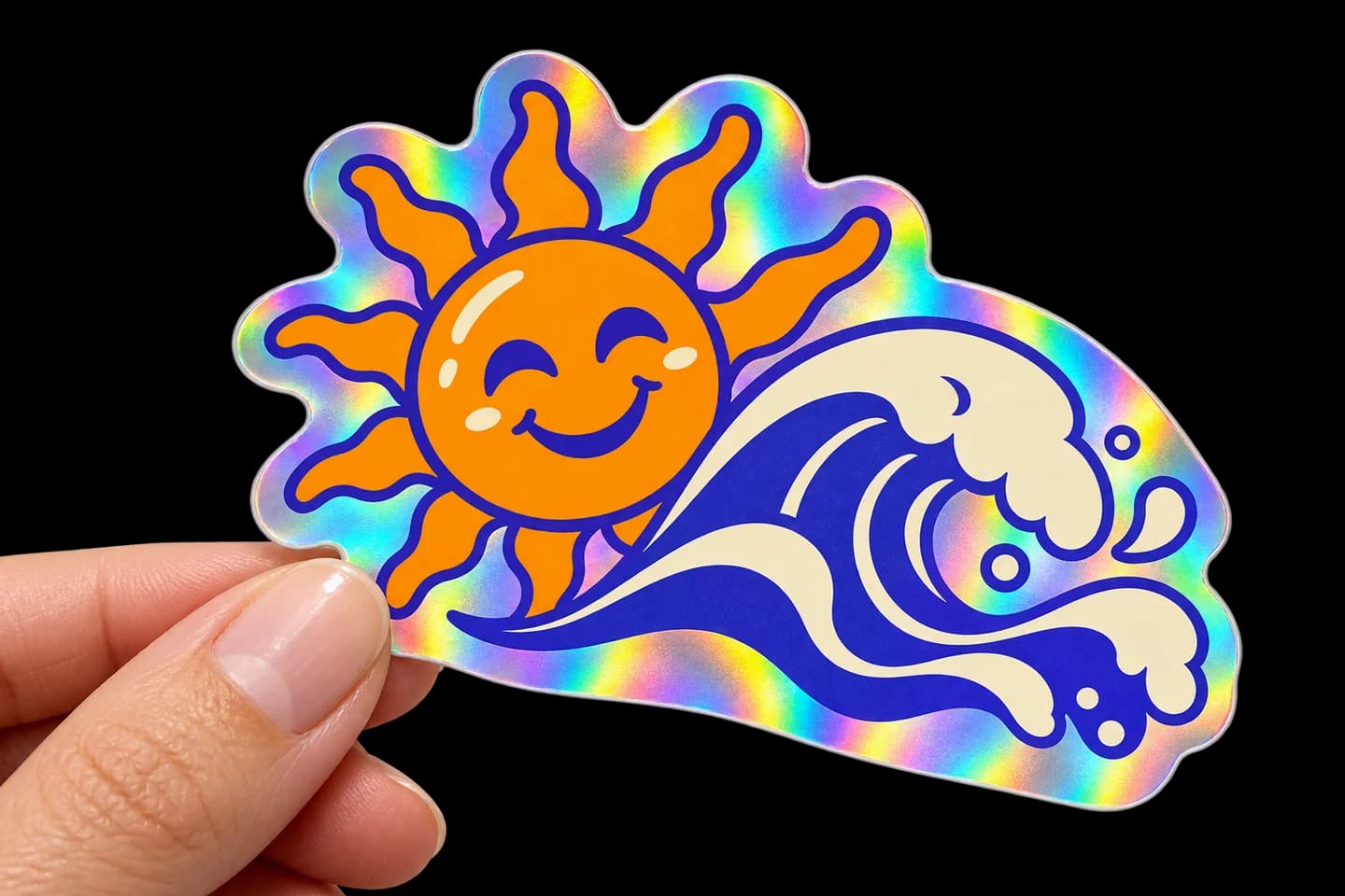 Illustrative close-up of a hand holding a sun and wave holographic sticker with rainbow reflections