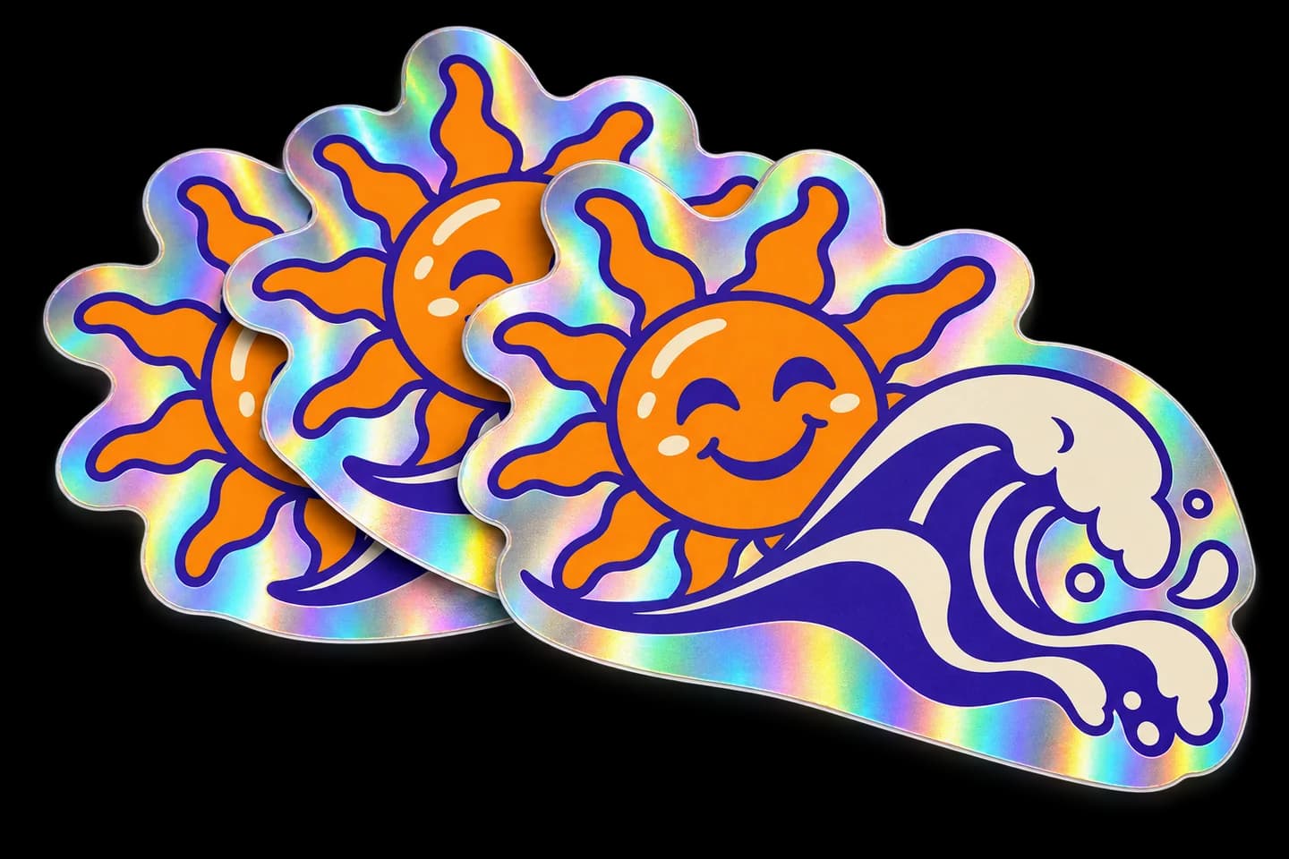 Overlapping custom sun and wave stickers showing reflective rainbow holographic edges